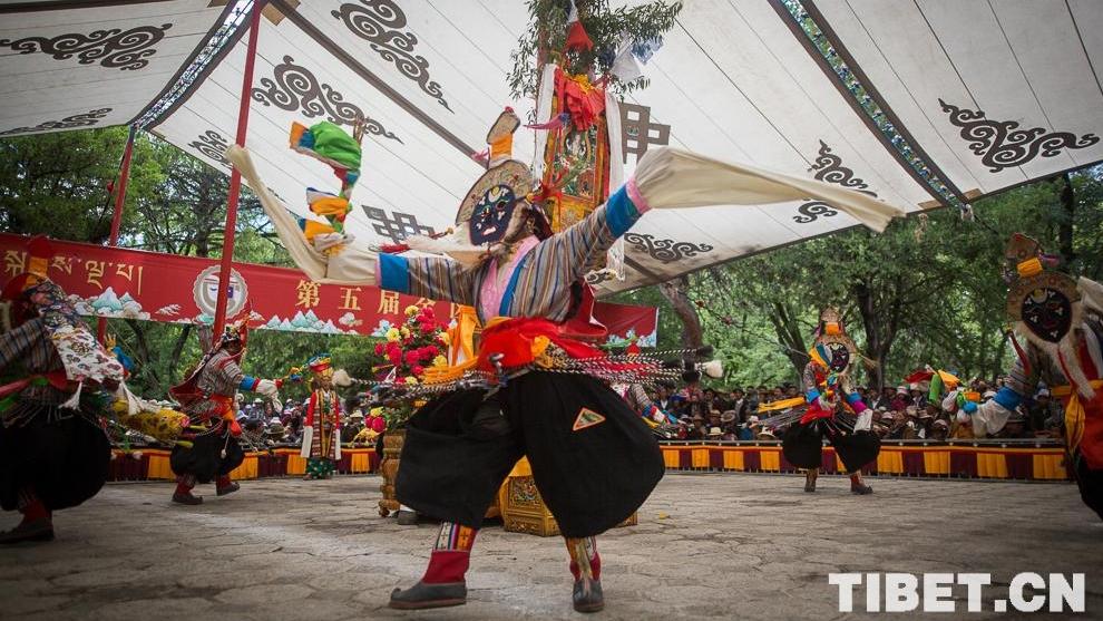 Tibet residents welcome New Year with yak stew, mask dance performances