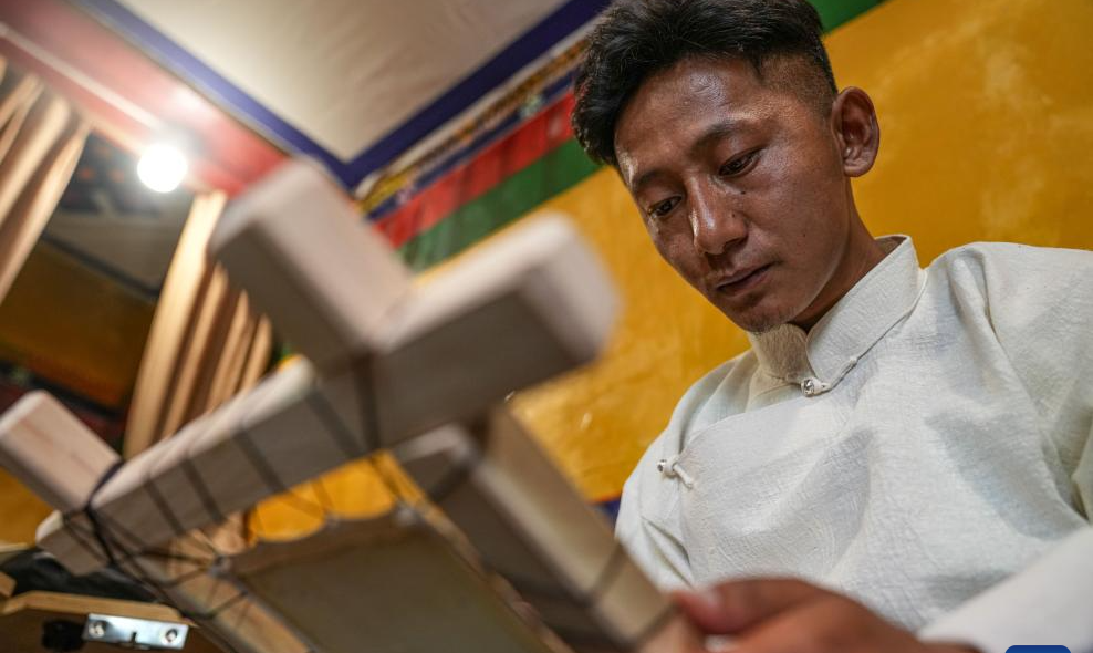 Former thangka painter turns childhood courtyard into trendy cafe in Lhasa