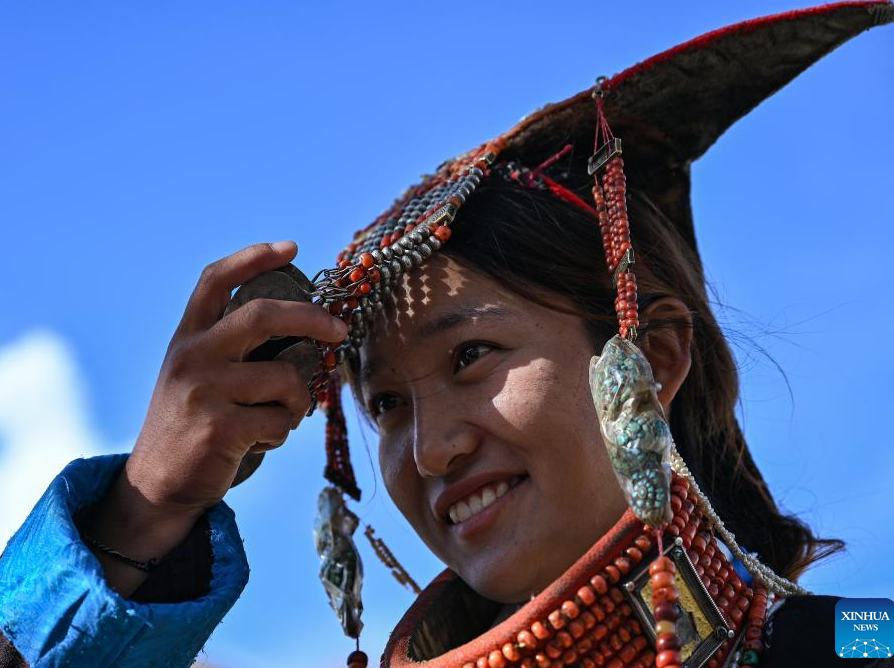 Villagers display folk costume in Pulan County, SW China's Xizang