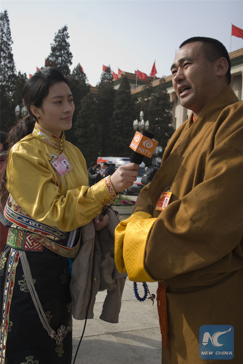 Photo of Chimed Wangmo doing an interview during China's annual national legislative and political consultative sessions in Beijing in March 2011. (Photo provided by Chimed Wangmo)