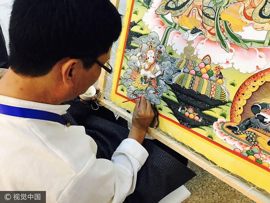Across China: Tibetan students find focus and a future in Thangka painting