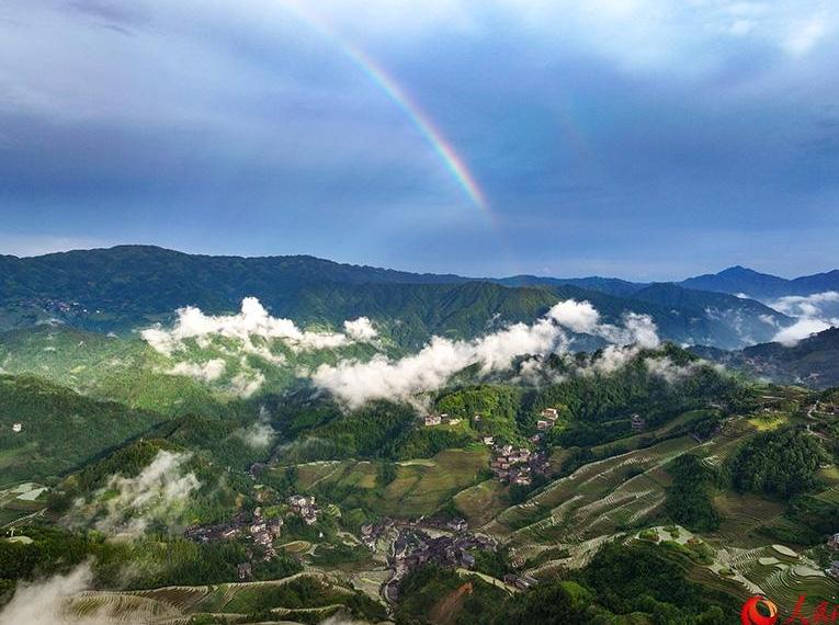 Rainbow appears over Longji Rice Terraces in China's Guangxi