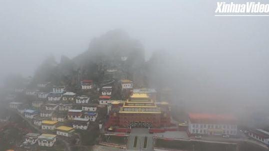 Ascend to the Zezhol Monastery sitting high on the cliffs in Tibet