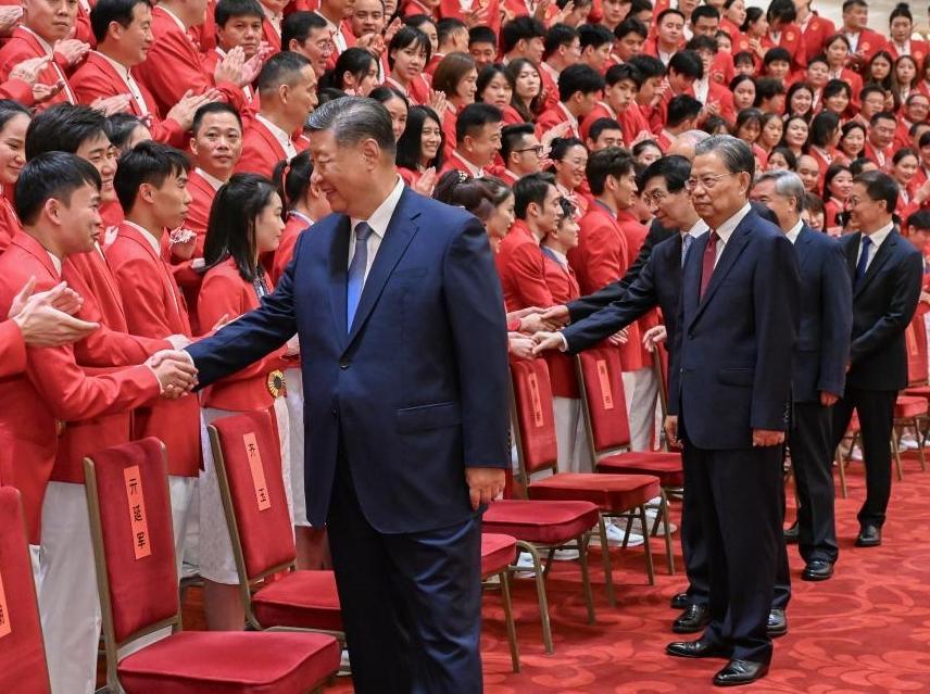 Xi hails Olympians for winning glory for country