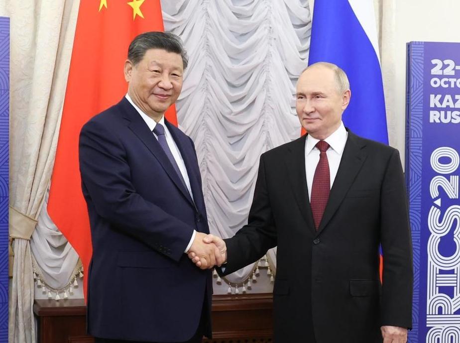 Xi says China, Russia find right way for neighboring major countries to get along with each other