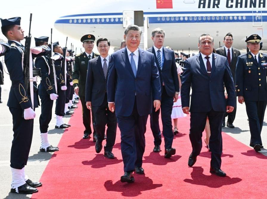 Xi arrives in Lima for state visit to Peru, APEC meeting