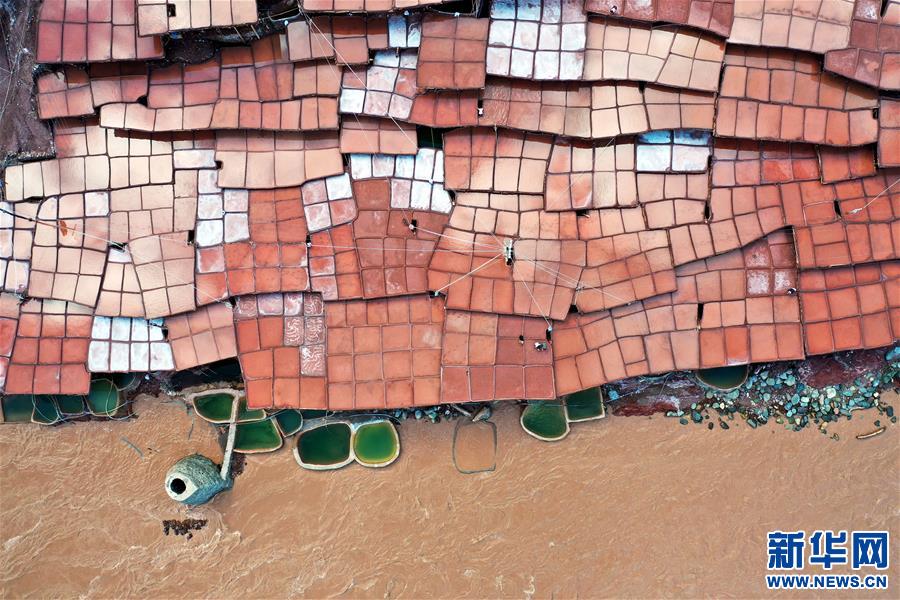 Aerial view of colourful salt pans in SW China's Tibet