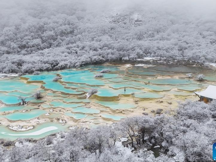 Scenery of colorful pond cluster at Huanglong scenic area in China's Sichuan